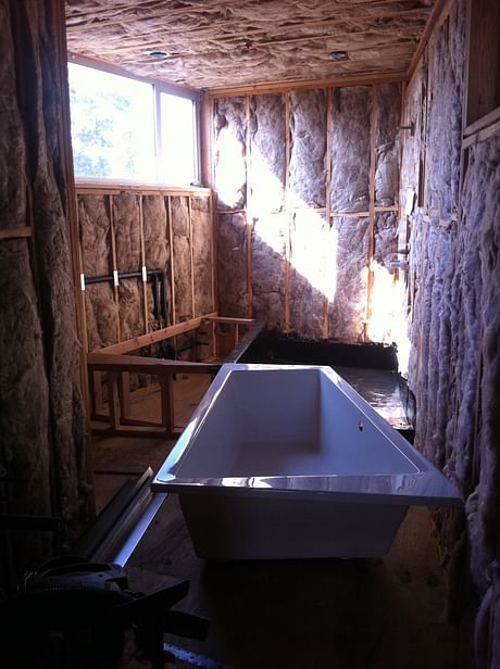 Setting and trapezoidal shaped tub into a trapezoidal shaped room, in Manhattan Beach.