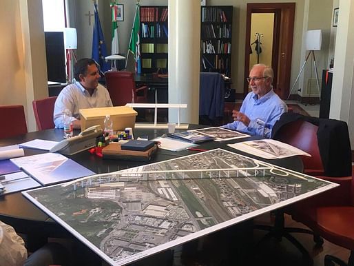 The photo shows Renzo Piano discussing designs for a replacement bridge with the governor of the Liguria region, Giovanni Toti. Image via Toti's Facebook page.