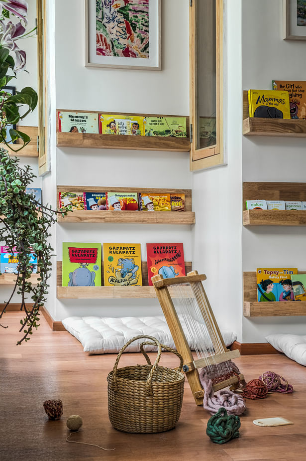 Reading shelves at comfortable heights to allow freedom of choice to kids