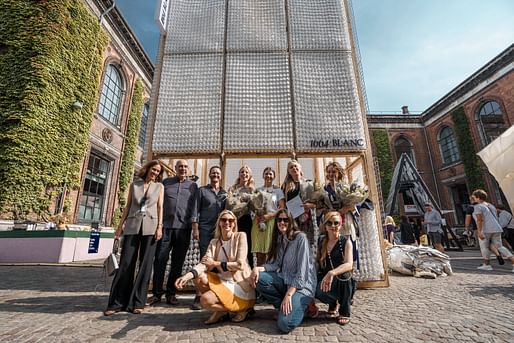 The team and the jury in front of the first prize pavilion. Photo: Joakim Züger