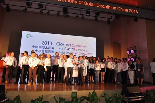 Team UOW accepting the First Prize award at the closing ceremony of 2013 SD China. Photo via illawarraflame.com.au