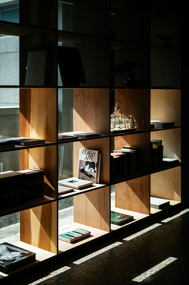Image Description: 2FL Cafe bookshelf beside Corridor Copyright: Alien Art / Shao Yaman