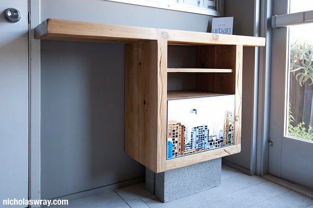 TV console from reclaimed materials. Photo of Vancouver for the door