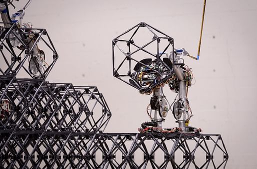 A Scaling Omnidirectional Lattice Locomoting Explorer (SOLL-E) builder robot carries a soccer ball-sized building block called a voxel – short for volumetric pixel – during a demonstration of NASA’s Automated Reconfigurable Mission Adaptive Digital Assembly Systems (ARMADAS) technology...