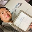 Henry Tsang and his award.