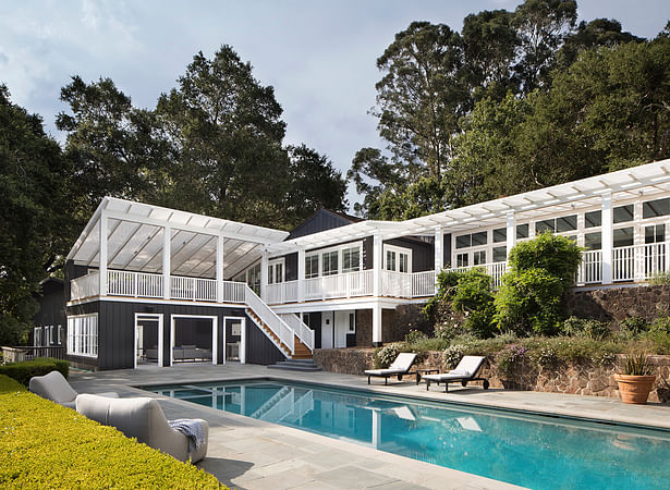 The ground-floor loggia is often active given easy pool access, a custom kitchenette, screening space and ping-pong table. 