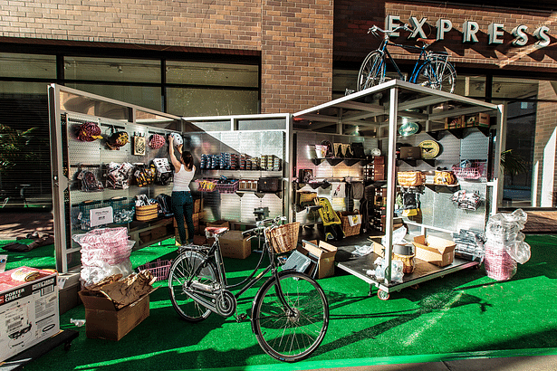 The 'Touch' BLOC opens up fully to create a pop-up retail experience that the public can inhabit. It is seen here hosting the Flying Pigeon bicycle store during CicLAvia festival.
