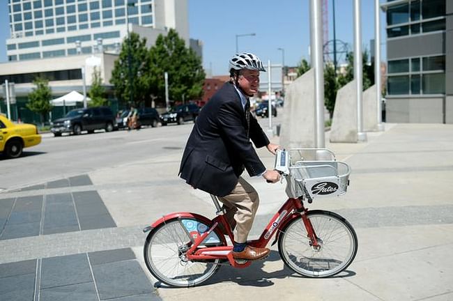 Brad Buchanan, the new director of the Denver Department of Community Planning and Development, rides a B-Cycle to a meeting last month. (Hyoung Chang, The Denver Post)