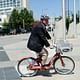 Brad Buchanan, the new director of the Denver Department of Community Planning and Development, rides a B-Cycle to a meeting last month. (Hyoung Chang, The Denver Post)