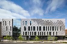 A ‘textural and reflective building skin’ wraps the University of Washington’s new Health Sciences Education Building