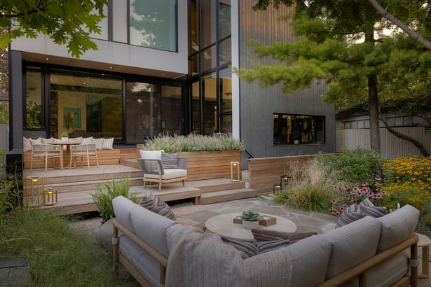 Patio areas nest into the house form