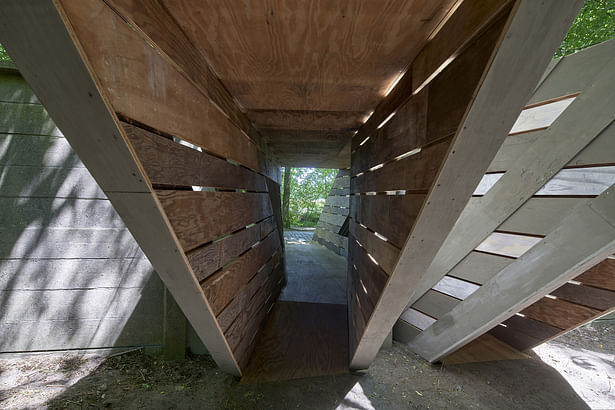 view inside the gate bridge pavilion with the beautiful wood patterns_seen from the monastery garden, © René de Wit