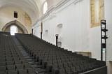 Main performance hall in church nave. Photo: Miran Kambič