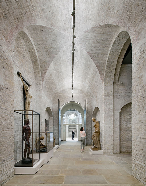 The dramatic exhibition spaces in 'The Vaults' are reminiscent of Chipperfield's careful renovation of the Neues Museum in Berlin. Credit: Simon Menges.