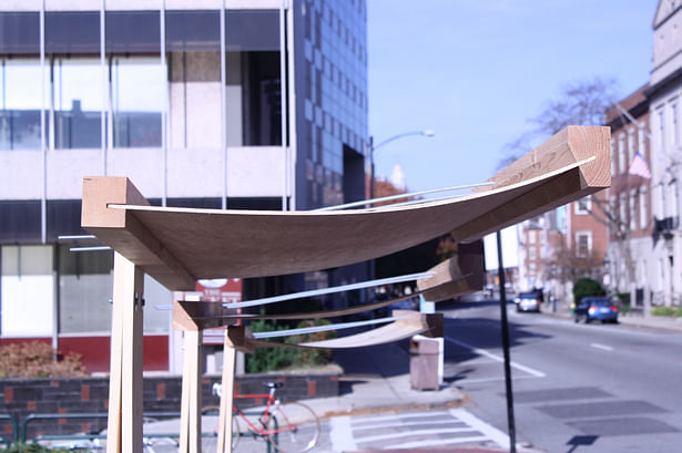 Threaded rods are used to pull tension into the awnings and allow water to be channeled away.