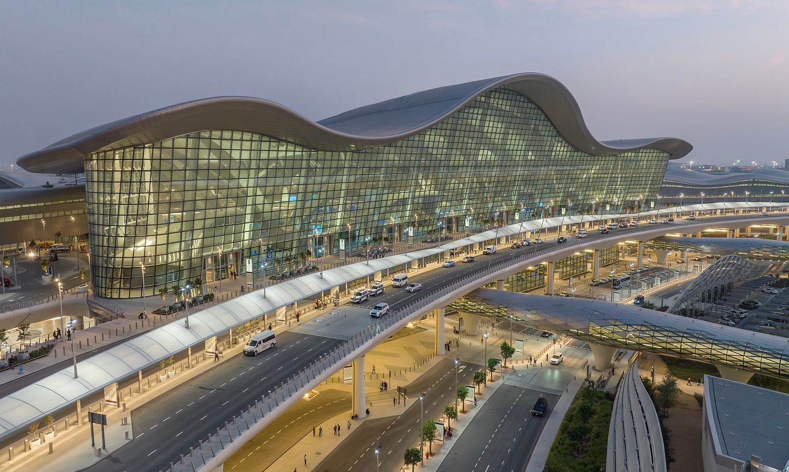 KPF completes Abu Dhabi airport inspired by undulating sand dunes ...