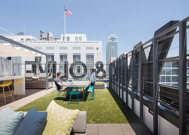 Lounge seating, communal dining tables, bar seating and barbecues create luxurious outdoor rooms on the seventh-floor deck.