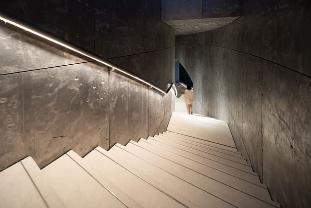 Curved stairs from the fourth floor to the roof