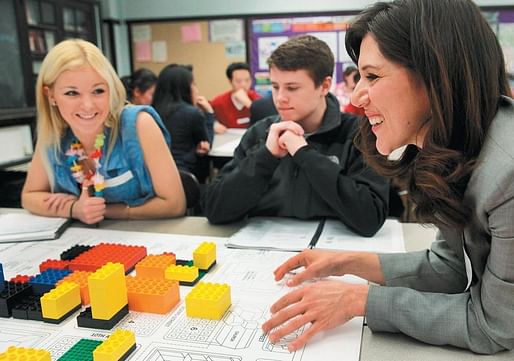 Boston Latin’s Sarah Malone and Stephen Powers with Melissa Tintocalis of the Urban Land Institute. (Wendy Maeda/Globe Staff)