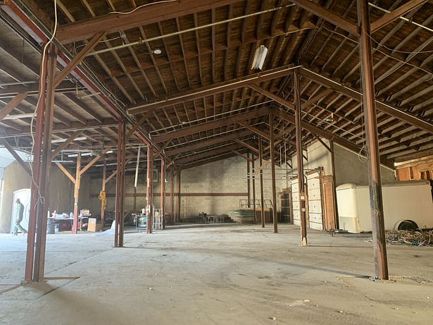 Concealed beneath a lay-in ceiling, the building's hallmark sawtooth structure remained hidden from view. 