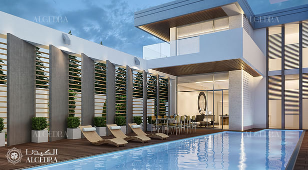 Swimming pool lounge area in modern villa