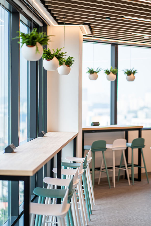 Corporate interior design of Forrester Singapore - Pantry in light colours with a view, designed by Space Matrix