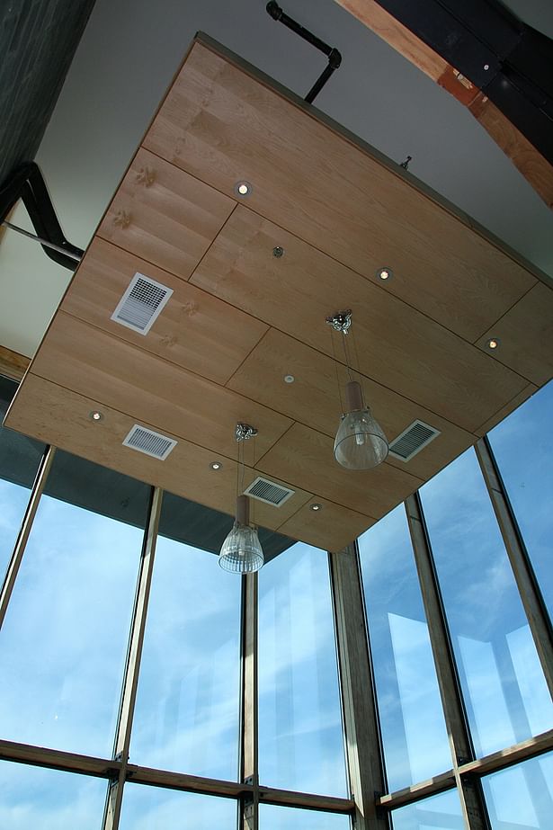 The clearstory of The Green Building is used as an office conference room. The glass has 30% recycled content and the aluminum frame around each window has 70% recycled content. 