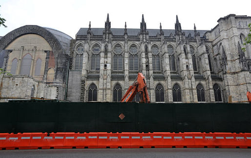 A construction site for two 15-story apartment towers that would block this view of the Cathedral Church of St. John the Divine. Credit Richard Perry/The New York Times