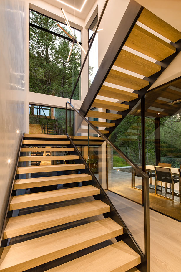 Minimalist stair in a glass filled space Photo by Steve Mundinger