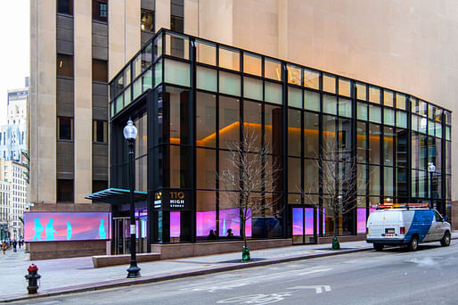 Exterior view showing mirror extruding to street from lobby. © LasSalle Investment Management