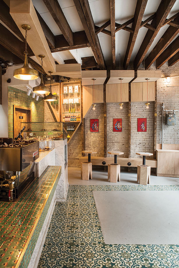 Artisanal tiles are carried throughout the custom designed espresso bar. 