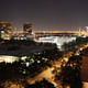 Aerial night view of the Fayez S. Sarofim Campus, with the Nancy and Rich Kinder Building and the Glassell School of Art. Courtesy of Steven Holl Architects.