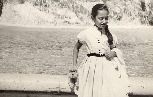 A young Zaha Hadid stands in front of the Trevi fountain in Rome. Image from her family archives, via CNN
