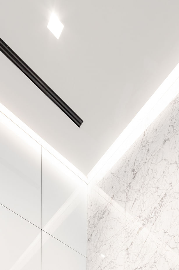 Cove detail where suspended ceiling meets wall finish