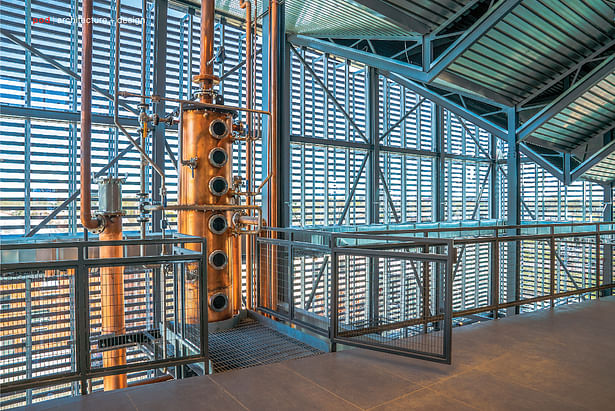 Gates provides easy access to the still for the distillery team at every level.