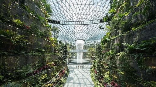 Changi Airport's Rain Vortex is a 130-foot indoor waterfall. Image courtesy of Changi Airport Group