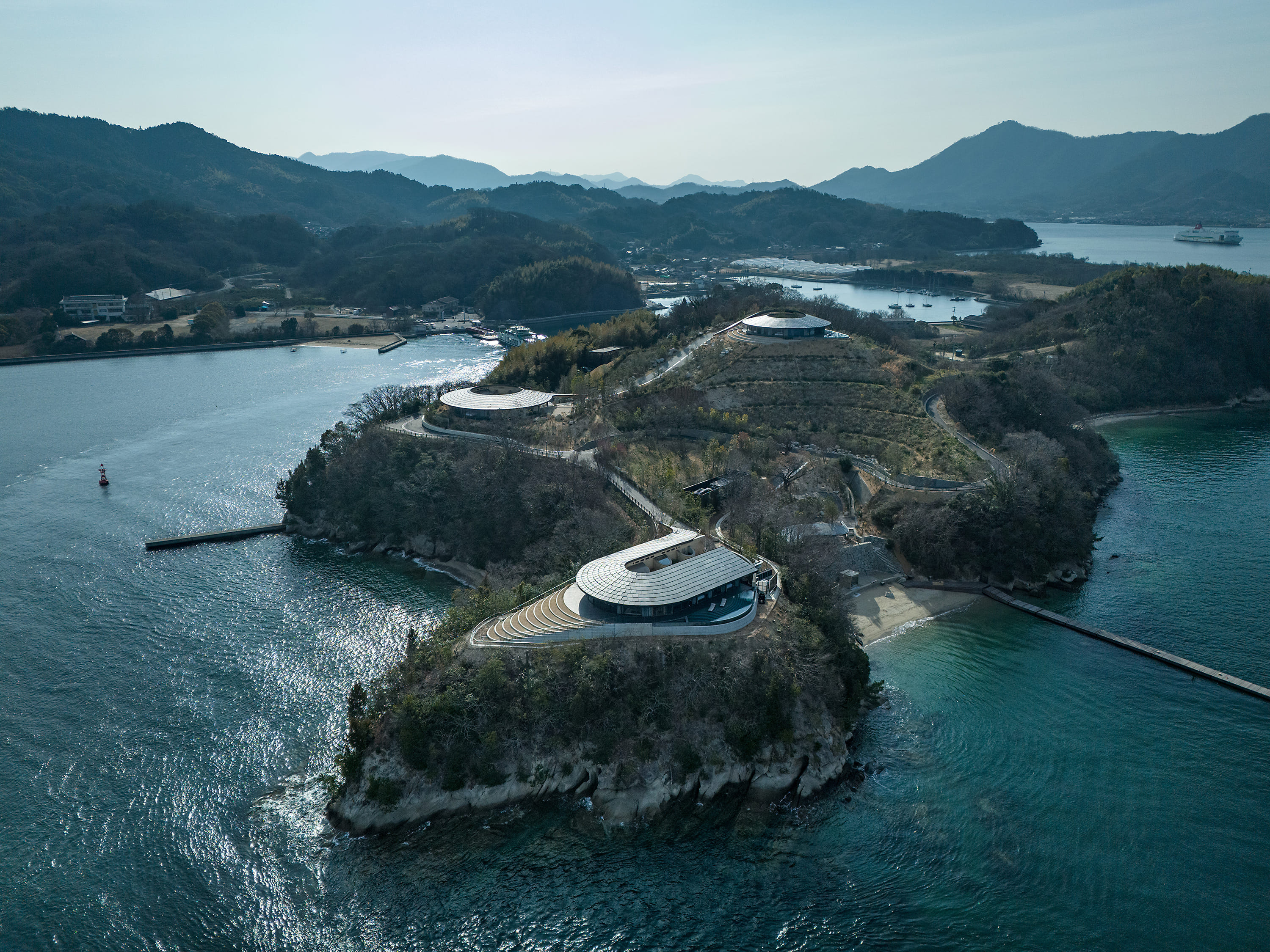 Island vistas and rammed earth star in BIG's Japanese NOT A HOTEL