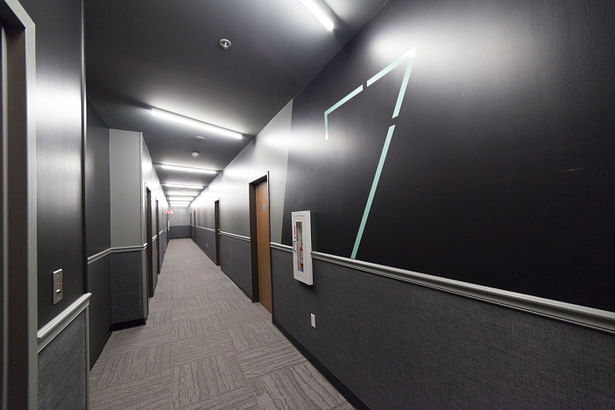 Residential hallway design by Synecdoche Design Studio