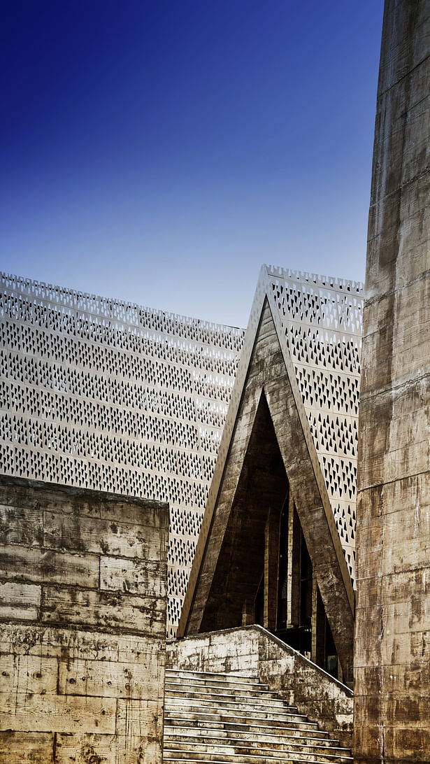 concrete & perforated bronze steel plate Credits:West-line Studio
