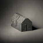 John Pawson presents simplistic carved, stone miniature for Salvatori's The Village project
