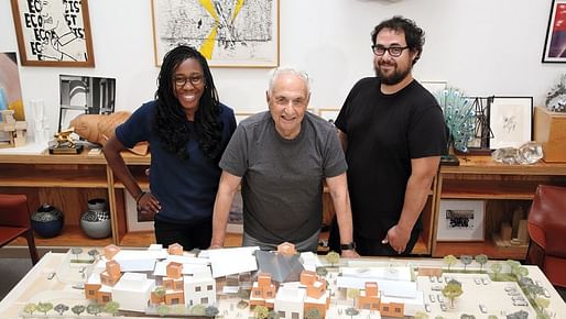Frank Gehry — here with Gehry Partners architects Precious Aiyeloja and his son Sam — proudly presenting a model of the proposed 50,000-square-foot campus for the Children's Institute in the Watts neighborhood of Los Angeles. (Photo: Glenn Marzano / courtesy of Children's Institute, Inc...