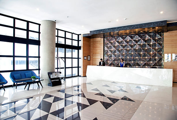 Golden Tulip Lobby by PHL Architects