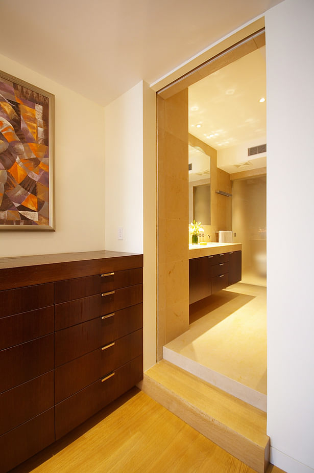 The details and materials of the living floor are repeated throughout the master suite
