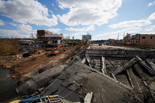 Destroyed infrastructure in Bucha, Ukraine, April 4, 2022. Image courtesy President Of Ukraine/<a href="https://www.flickr.com/photos/president_of_ukraine/51988162289/in/album-72177720297920646/">Flickr</a> (Public Domain)