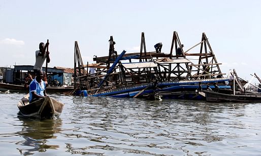 Residents work to dismantle the Makoko Floating School after it collapsed on Tuesday. Photograph: Akintunde Akinleye/Reuters