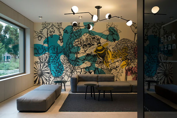 One of the entrance spaces features a mural “Meadow from a dream” by Miron Milic
