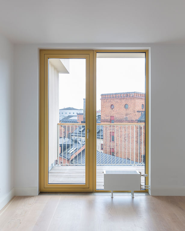 Large windows maximize natural light exposure