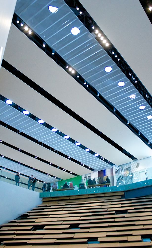 Solatube Daylighting Systems creates the impression of “floating” between the roof and an open mesh layer below the roof
