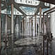 The main entrance foyer with the light columns, the transparent roof and the butterfly door handles on the main entrance doors. (Photo: Kari Palsila)