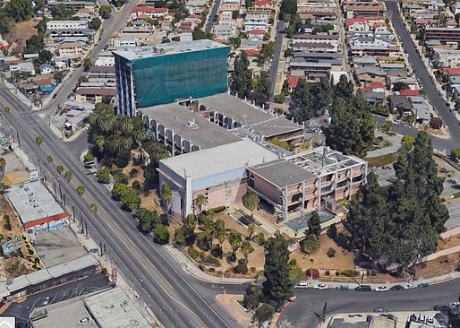Aerial view of the site on Sunset Boulevard. The mid-rise structure in the back has recently been converted into an apartment building. Image via Google Maps.